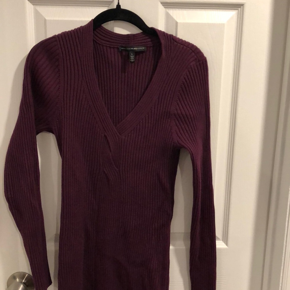 This is a burgundy/purple dress made of rayon, nylon, polyester, and cotton.